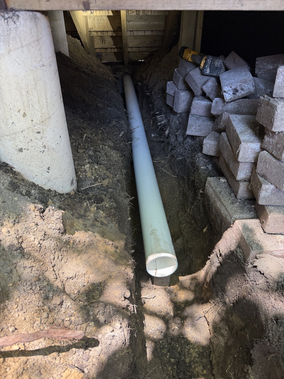 Pipe installation beneath the deck