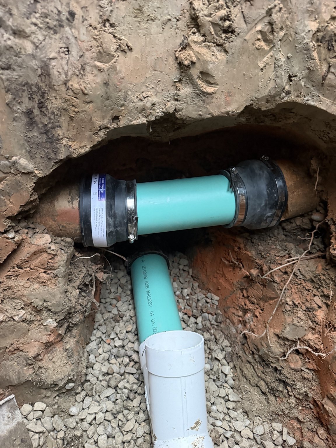 Replacement pipe connected to an existing sewer line