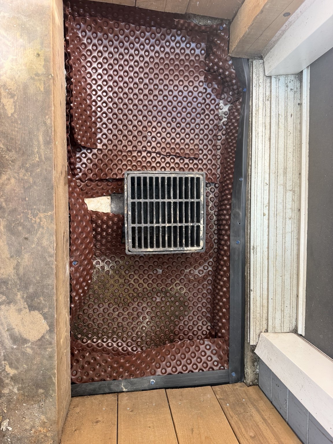 Dimpled membrane fitted before concrete placement