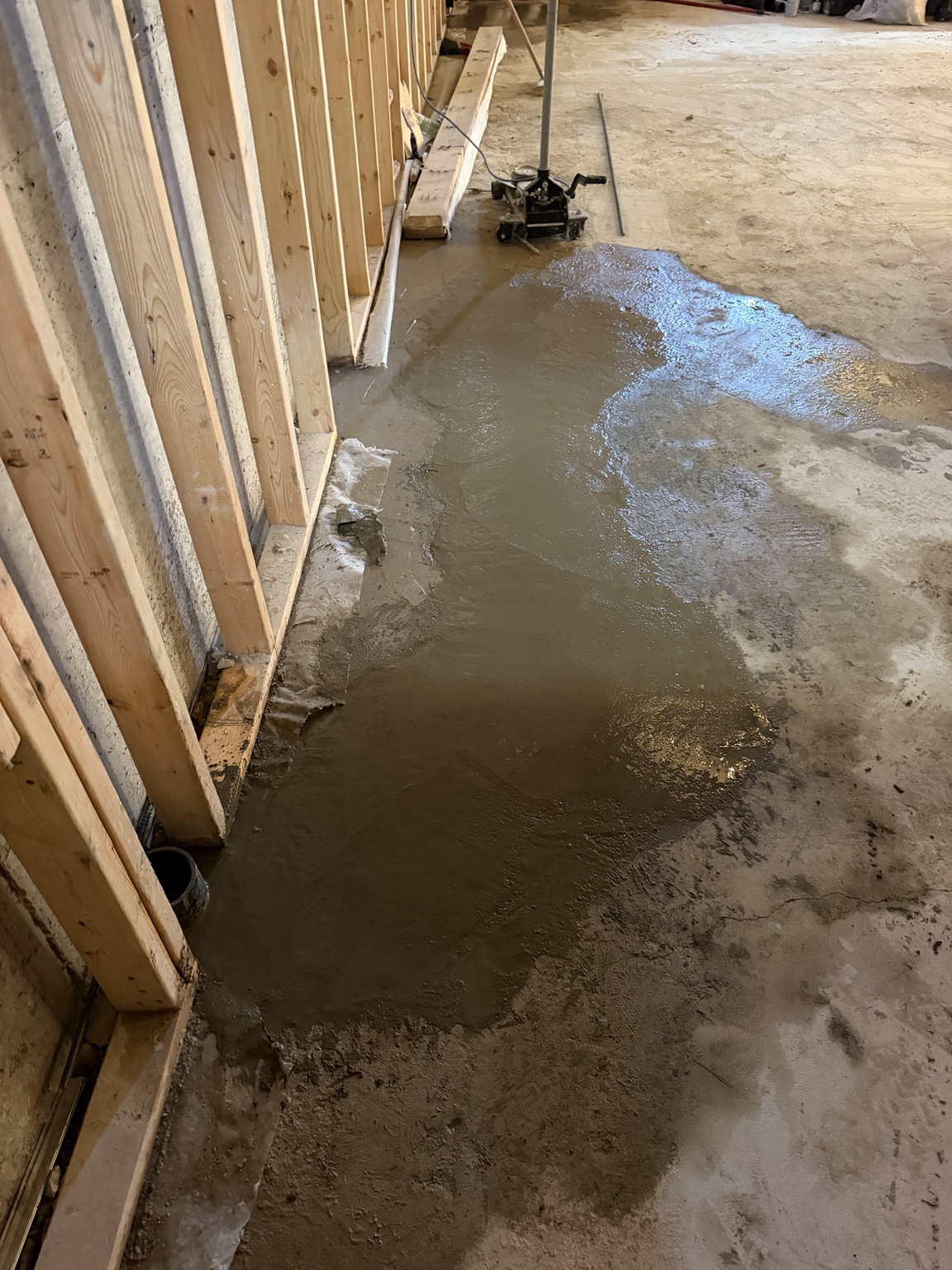 Fresh concrete floor restoration around the future stack connection