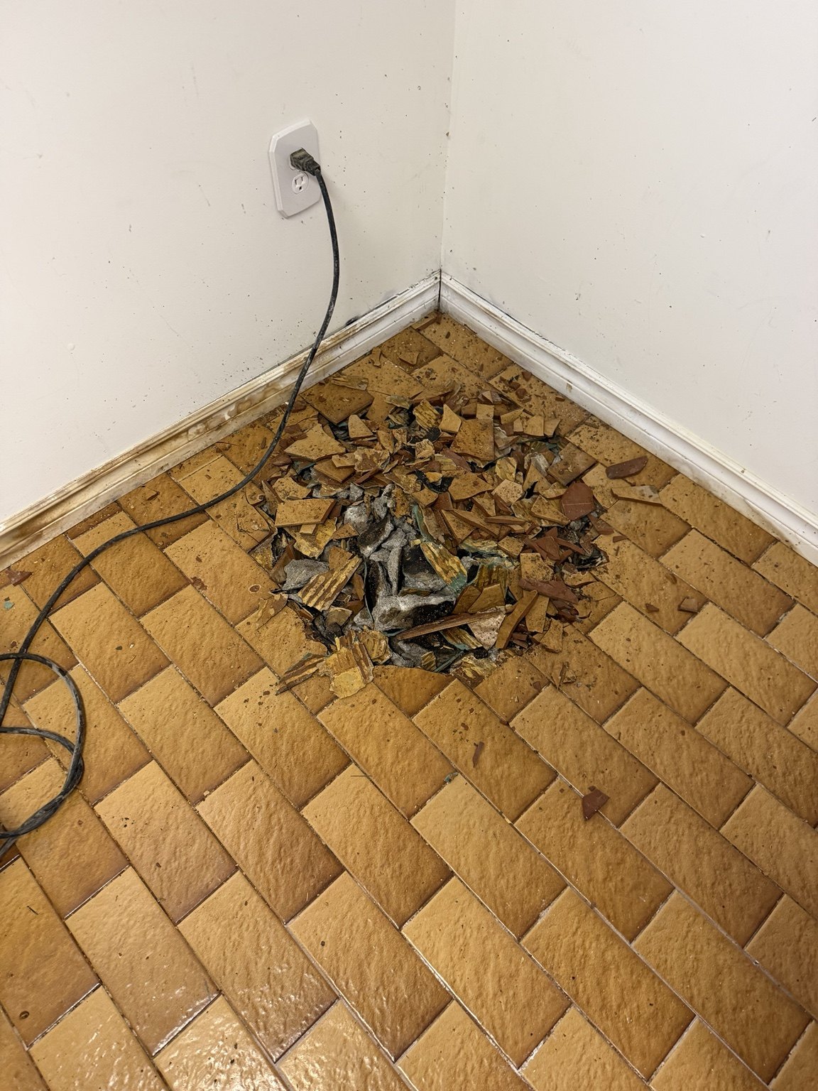 Tile and concrete floor opened